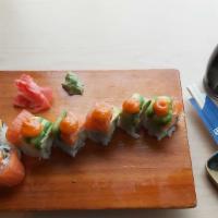 Hanamoto Roll (8) · Avocado, tempura shrimp inside layered with salmon and spicy sauce.