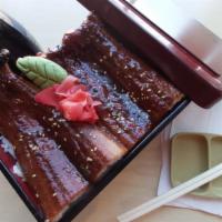 Unagi Don · Broiled eel over rice in a box and topped with eel sauce.