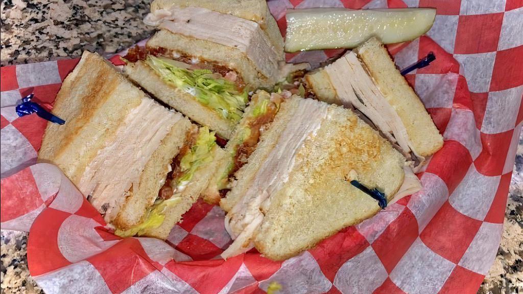 Chicken Club · Grilled chicken, brie, smoked bacon and plum tomatoes.