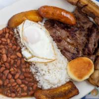 Bandeja Paisa · Carne asada, arroz, frijoles, chicharron, chorizo, huevo frito, plátano Maduro y arepa (typi...