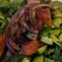 Mixed Green Salad · Mixed green salad consisting of lettuce, tomato, cucumber, arugula and onions.