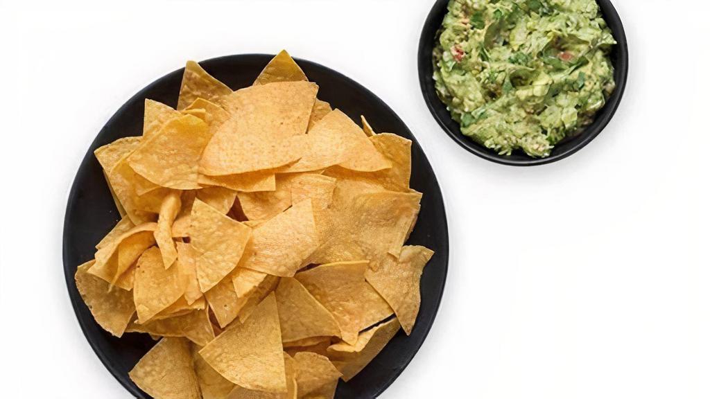 Chips And Guacamole · Bag of house fried corn tortilla chips. Served with a side of fresh guacamole!