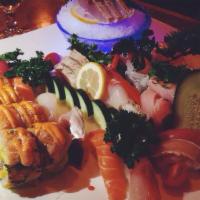 Sushi & Sashimi For 2 · 8 pieces of assorted sushi, 20 pieces of assorted sashimi and one chef special roll.