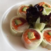 Shogun Roll · Tuna, salmon, yellowtail, avocado, masago, wrapped with cucumber, served with ponzu sauce.