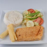 Paiche Frito Con Yuca Frita Y Ensalada / Fried Paiche Fish With Cassava And Salad · Fied paiche fish w/ cassava and salad.