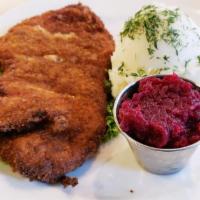 Chicken Schnitzel Dinner · Served with mashed potatoes.
