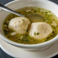 Matzoh Ball Soup - 1Qt Frozen · Rich chicken stock with pulled chicken, vegetables and Matzoh dumplings
