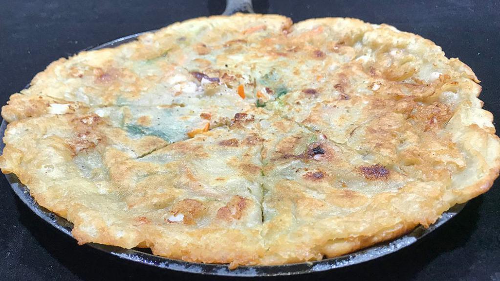 Hemul Pa-Jeon · 해물파전
Korean Seafood Pancake