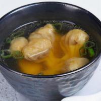 Tasty Mini Wonton Soup · Homemade mini pork wontons in clear chicken broth.
