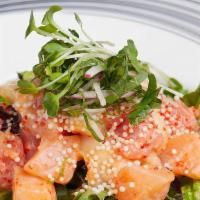 Sashimi Salad · Tuna, white tuna and salmon on mixed greens with soy vinaigrette.
