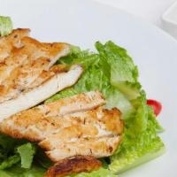 Grilled Chicken Salad · With organic greens.