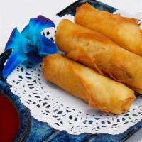 Mini Roll · Crispy vegetable spring rolls with sweet chili sauce.