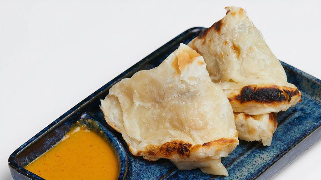 Indian Pancakes  · Traditional Asian style with coconut curry dipping sauce.