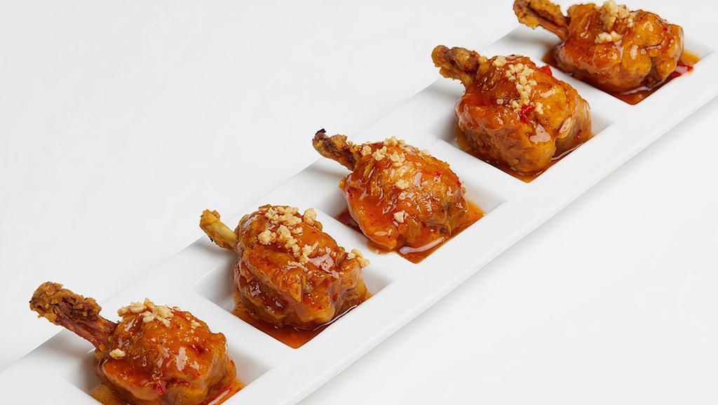 Thai Chicken Lollipop (5 Pieces) · Crispy chicken wings served with peanut and Thai sweet chili sauce.