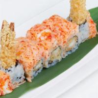 Volcano Roll · Spicy. Shrimp tempura, eel sauce, spicy king crab and kani.