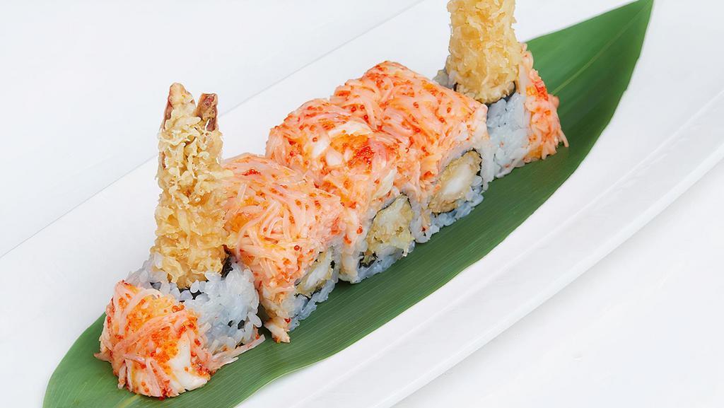 Volcano Roll · Spicy. Shrimp tempura, eel sauce, spicy king crab and kani.