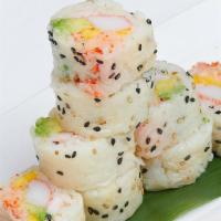 Moca Roll · Lobster salad, shrimp, mango, avocado kani and tobiko, wrapped with soy bean paper.