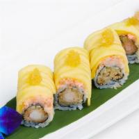 Golden Dragon Roll · Shrimp tempura, cucumber and mango, lobster salad, mango and golden mango sauce.