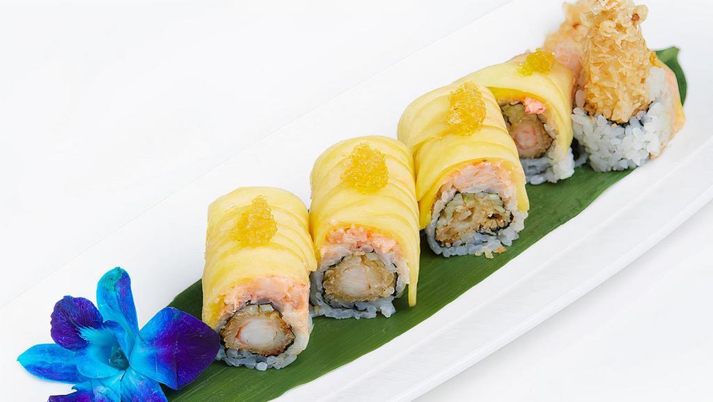 Golden Dragon Roll · Shrimp tempura, cucumber and mango, lobster salad, mango and golden mango sauce.