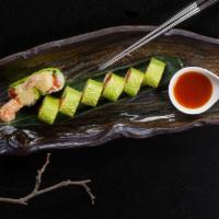 King Lobster Roll · Inside: lobster tail tempura, spicy tuna and avocado. Outside: wrapped with soy bean paper.