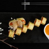 Paradise Roll · Inside: fried banana, spicy snow crab, shrimp tempura. Outside: soybean paper served with ma...