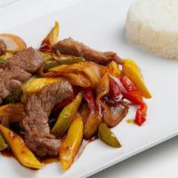 Mongolian Skillet Beef · Marinated, sliced and sautéed with ginger, scallions, onions & bell peppers with chef's brow...