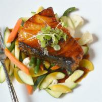 Char Grilled Chilean Sea Bass · Marinated sea bass with chef's miso sake dressing served with sauteed mixed vegetables.