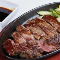 Ribeye With Mixed Vegetables · 14 oz. ribeye marinated with moca's black pepper sauce.