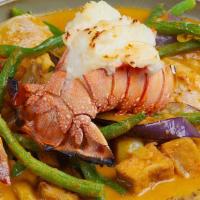 Seafood Thai Red Curry Casserole · Mixed lobster, shrimp, scallops string beans & tofu in spicy coconut curry sauce.