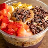 Astoria Bowl · Bananas, strawberries, cacao nibs, bee pollen, granola and almond butter.