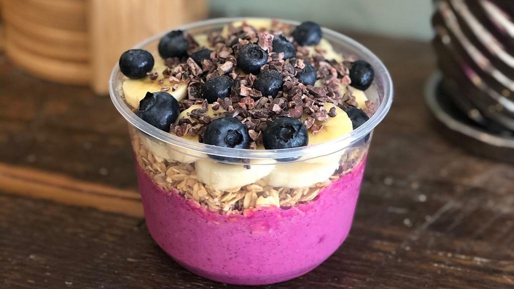 Power Bowl · Base: dragon fruit, banana, vanilla protein, peanut butter and almond milk. Toppings: banana, blueberries, cacao nibs and granola. *Granola is Gluten-Free, Vegan, and Organic
