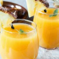 Inflammation Juice · Freshly squeezed carrot, pineapple, spinach, and ginger juices.