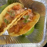 Duo Fish Taco (2 Pieces) · Asian homemade taco shell. Served with spicy tuna or spicy salmon.