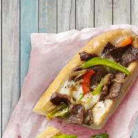 Philly Cheesesteak · Beefsteak, hero bread, mushrooms, caramelized onions, peppers, melted mozzarella cheese.