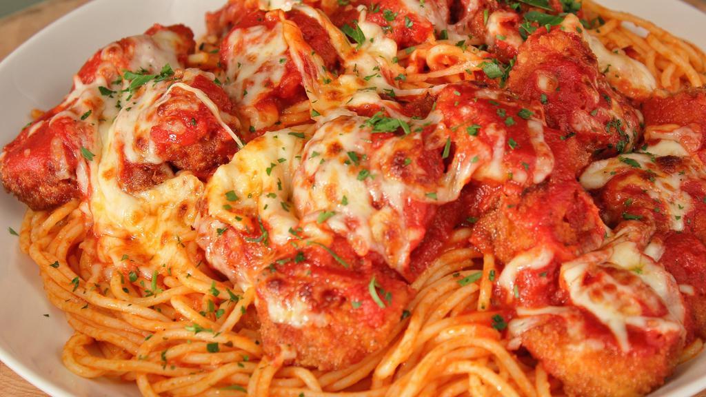 Shrimps Parm With Spaghetti · Grilled shrimps, tomato sauce, melted mozzarella cheese with spaghetti and parmesan cheese.