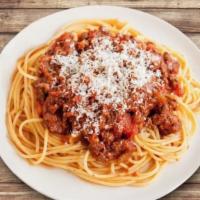 Pasta Bolognese · Ground beef, mushrooms, olives, spaghetti, tomato sauce and parmesan cheese.