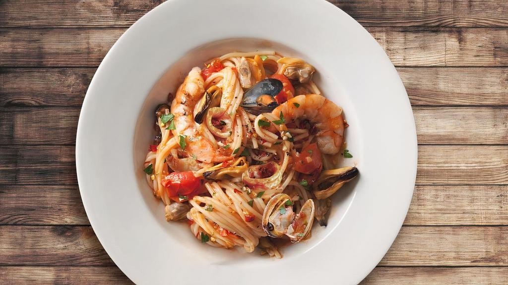 Seafood Pasta · Mix of shrimps, mussels, clams, calamari with linguine in a tomato sauce and basils.