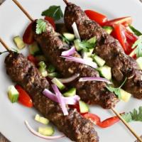 Kofte Kebab · Prime meat mixed with onion and parsley grilled on skewers.