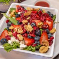 Berry Salad · Spring greens with goat cheese, walnuts, fresh blueberries, strawberries and cranberries. Ra...