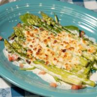 Asparagi Con Gorgonzola Dolce · Baked asparagus with melted sweet gorgonzola cheese