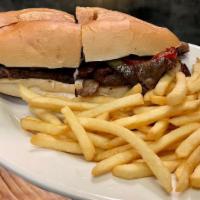 Cheese Steak Sandwich With French Fries · Steak, cheese, and caramelized onion sandwich.