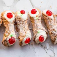 Large Cannoli · Fresh circos cannoli shell filled to order with signature ricotta cream with chocolate chips...