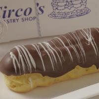 Eclair · Filled with a vanilla custard cream and topped with the finest Belgian chocolate.