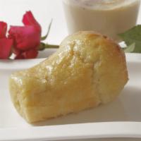 Baba Rum Cake · Our classic Brioche Baba soaked in sweetened Rum.