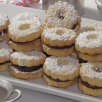 1/2 Lbs. Linzer Tart Cookie · Linzer Tarts are a shortbread cookie with a raspberry jam filling and topped with powdered s...