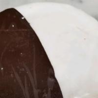 Black & White Cookie · A black-and-white cookie, half-and-half cookie, or half-moon cookie is a round cookie iced o...