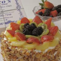 Fruit Supreme Cake · Seven inches serves 8 to 10. Vanilla cake soaked with raspberry brandy filled with French va...