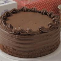 Chocolate Fudge Cake · Seven inches serves 8 to 10. Chocolate cake with chocolate fudge filling and coating.