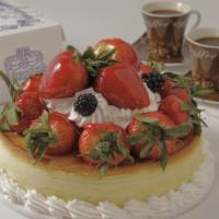 Ny Style Cheesecake With Fresh Strawberries · Seven inches serves 8 to 10.