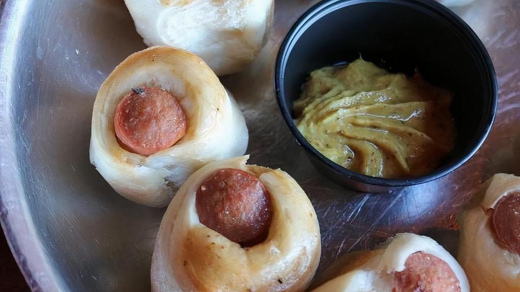 Dogs In Dough · All beef natural casing Sabrett hot dogs wrapped & baked in our pizza dough